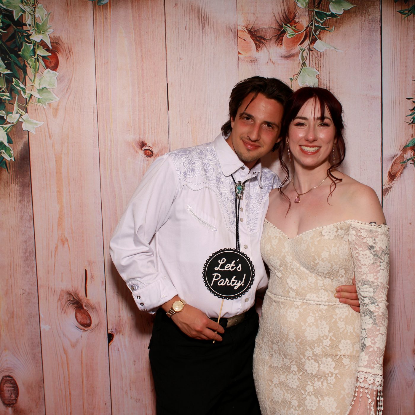 Wooden booth at outdoor wedding reception. PicPop, Coachella Valley